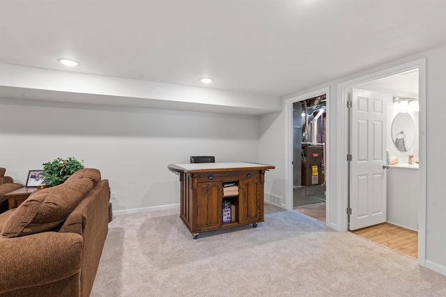 carpeted home office with heating unit