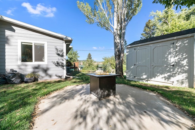 view of patio with a shed