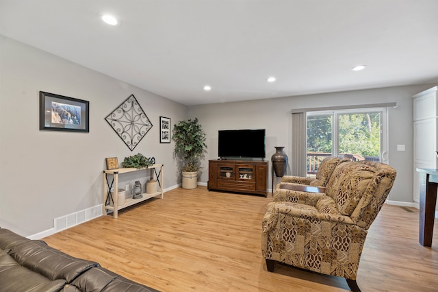 living room featuring light wood-type flooring