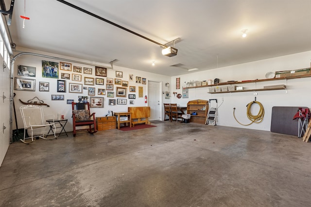 garage featuring a garage door opener