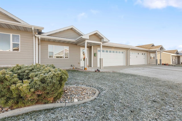 ranch-style home featuring a garage