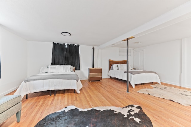 bedroom featuring hardwood / wood-style flooring