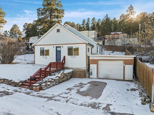 view of front of home with a garage