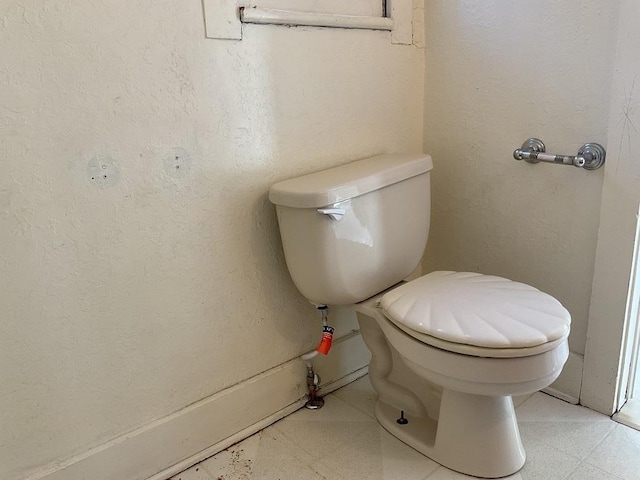 bathroom featuring toilet