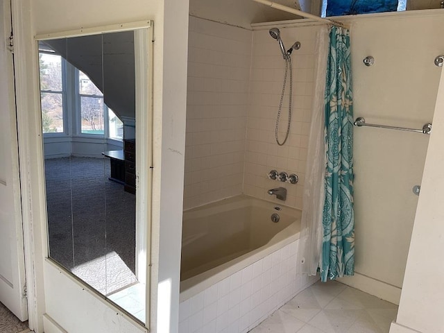 bathroom with shower / bathtub combination with curtain