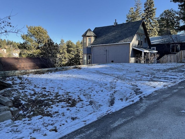 view of snow covered property