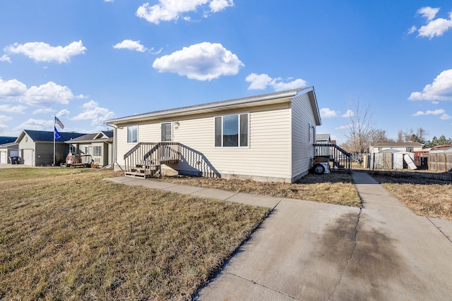 exterior space with a front lawn