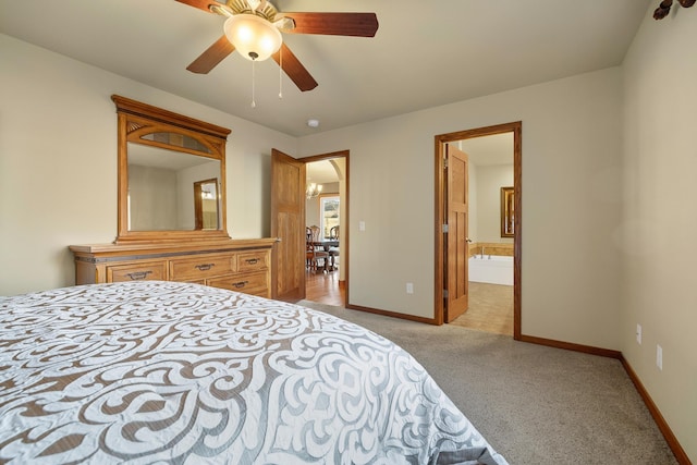 5017 Misty Woods Ln, Rapid City, SD 57701 - bedroom with ceiling fan, light colored carpet, and ensuite bath