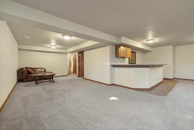 5017 Misty Woods Ln, Rapid City, SD 57701 - kitchen featuring light carpet and kitchen peninsula