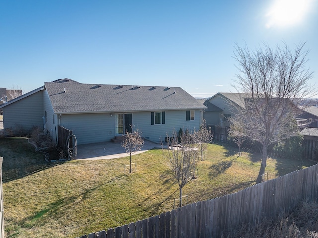 5017 Misty Woods Ln, Rapid City, SD 57701 - ranch-style home featuring a front lawn and a patio