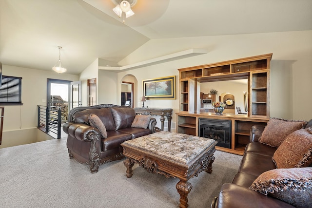 5017 Misty Woods Ln, Rapid City, SD 57701 - living room featuring ceiling fan, carpet floors, and vaulted ceiling