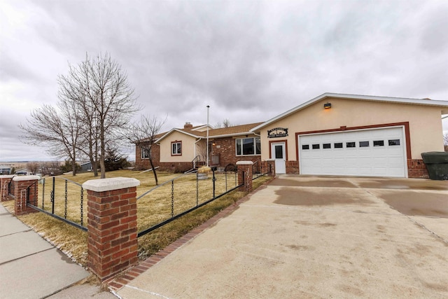 ranch-style house featuring a front lawn and a garage