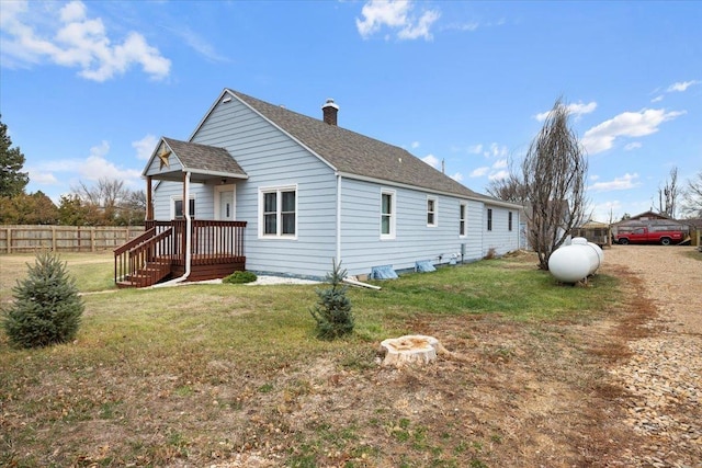 view of property exterior featuring a lawn