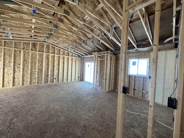 miscellaneous room featuring lofted ceiling