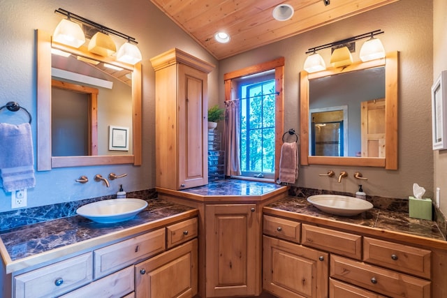 bathroom with vanity, lofted ceiling, and wood ceiling