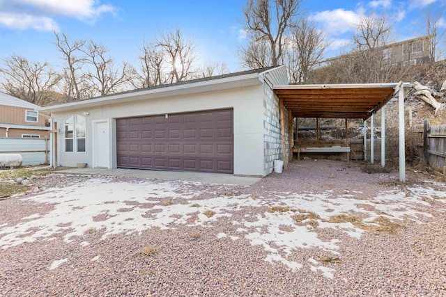 view of side of home with a carport