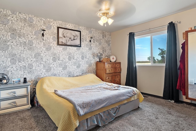 bedroom with ceiling fan and carpet