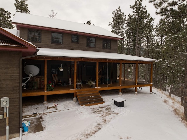 view of snow covered property