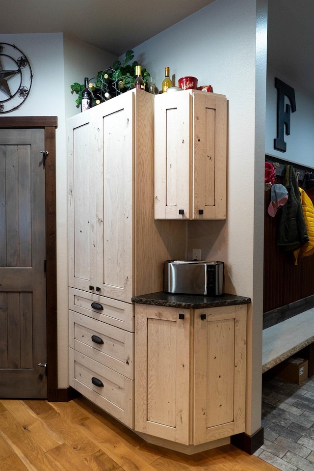 interior space with light brown cabinetry and light wood-type flooring