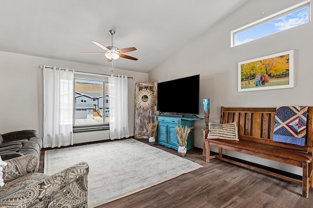 living room featuring high vaulted ceiling, dark hardwood / wood-style floors, ceiling fan, and a wealth of natural light