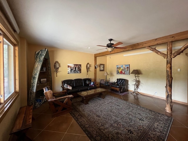 tiled living room with ceiling fan