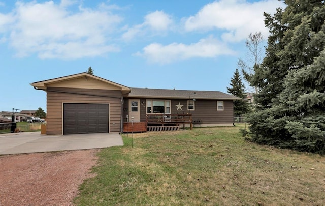 single story home with a front yard and a garage