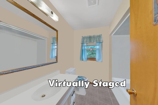 bathroom with vanity and tile patterned floors