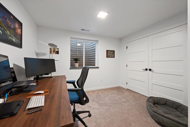 home office featuring carpet flooring