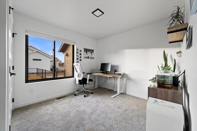 office area with light carpet