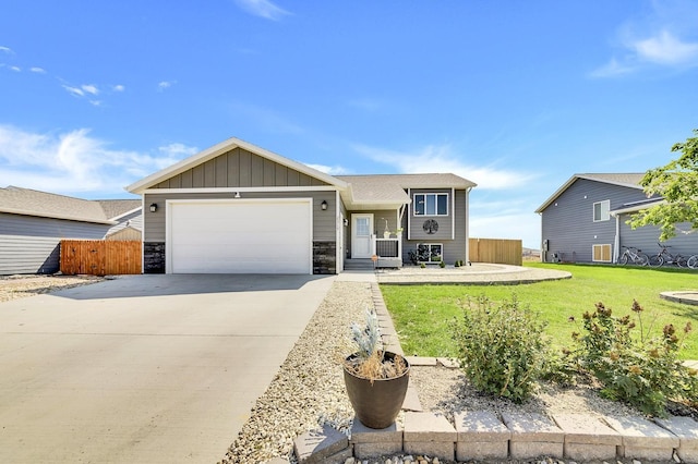 ranch-style house with a garage and a front yard