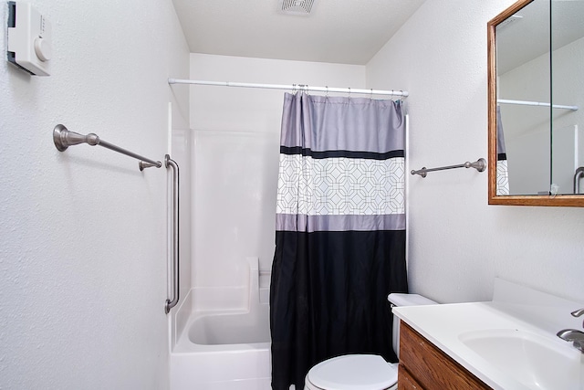 full bathroom with vanity, toilet, and shower / bath combo with shower curtain