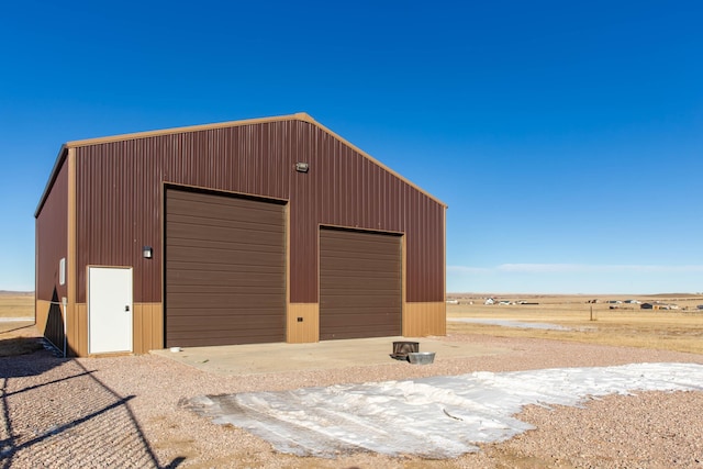 garage with a rural view