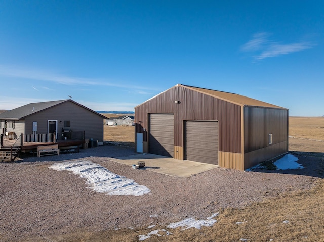 view of outdoor structure with a garage