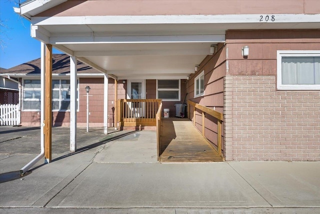 exterior space with a carport