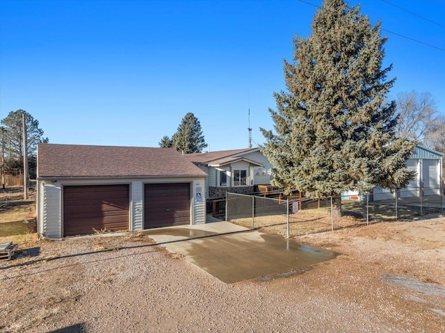 view of front of house featuring an outbuilding and a garage