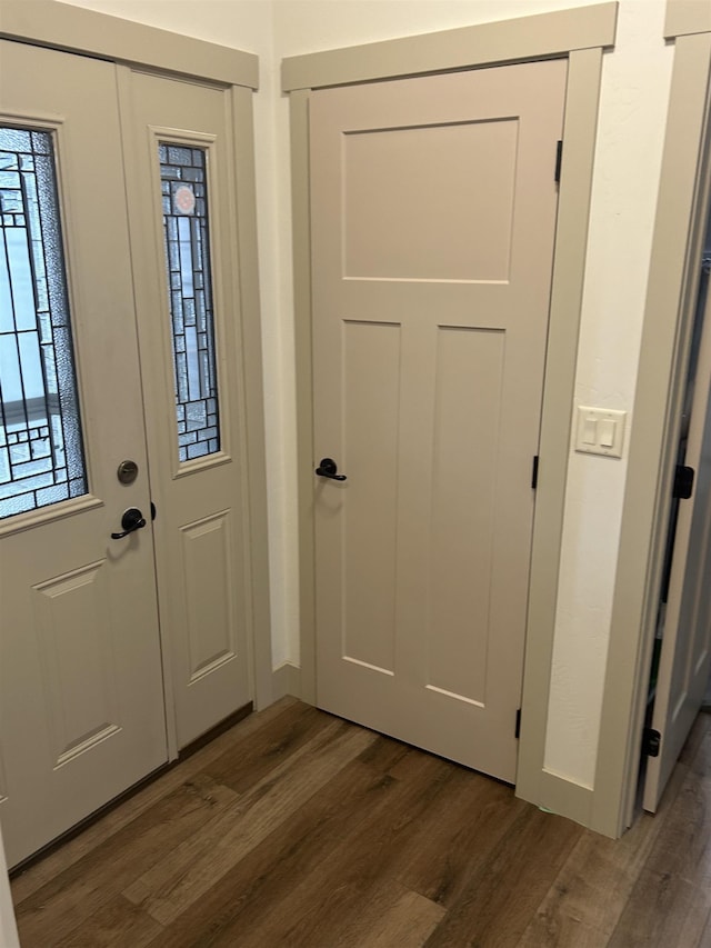 foyer featuring dark hardwood / wood-style floors