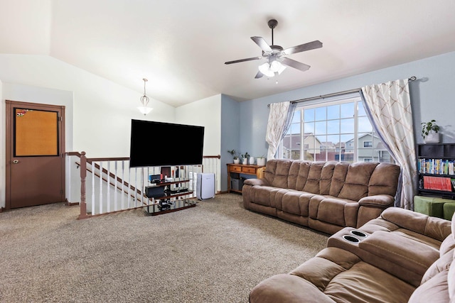 living room with carpet flooring, ceiling fan, and lofted ceiling