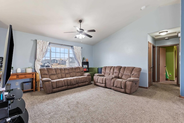 living room with carpet flooring, ceiling fan, and lofted ceiling