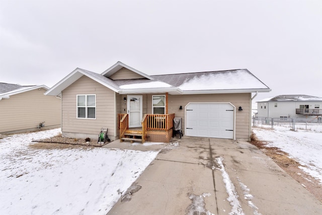 single story home featuring a garage