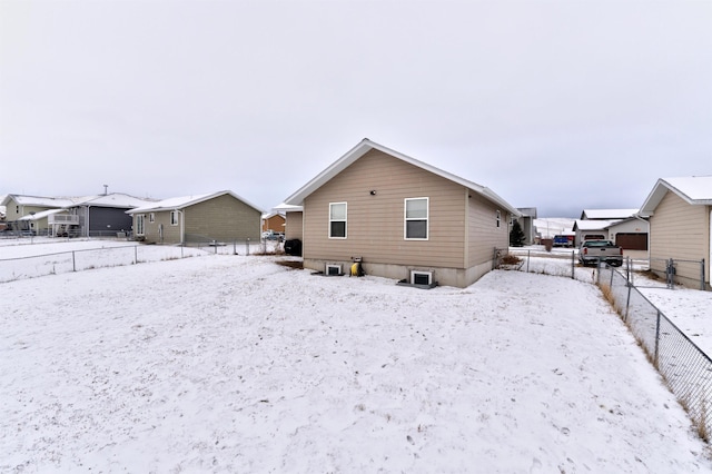 view of snow covered property