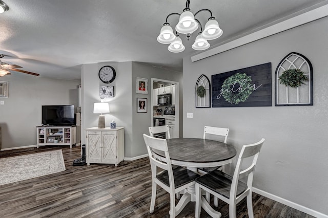 dining area featuring a textured ceiling, dark hardwood / wood-style floors, and ceiling fan