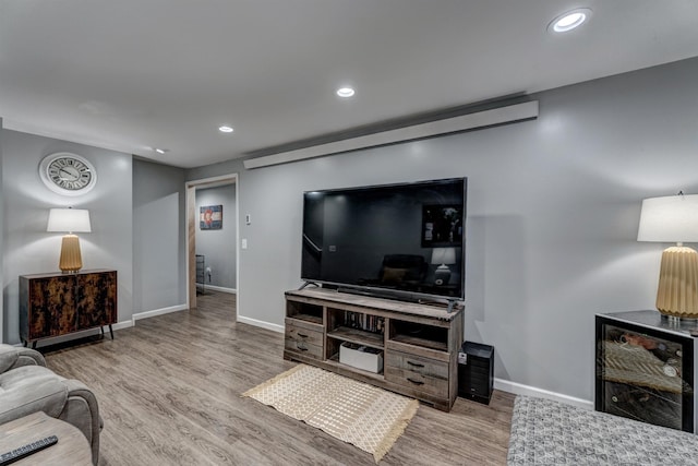 living room with light hardwood / wood-style floors