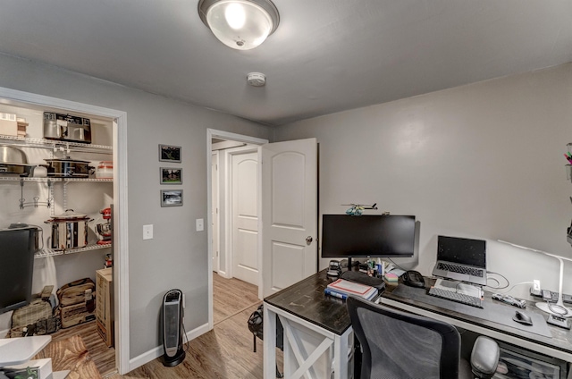 office area featuring light hardwood / wood-style flooring