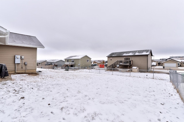 view of yard covered in snow