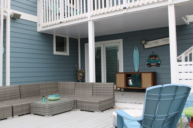 deck featuring an outdoor living space