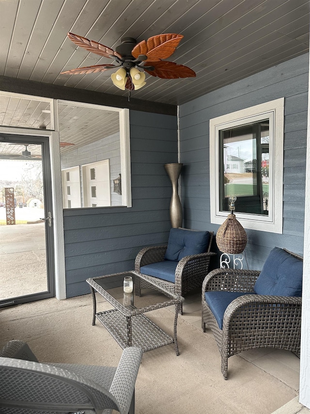 exterior space with ceiling fan