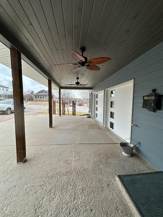 view of patio featuring ceiling fan