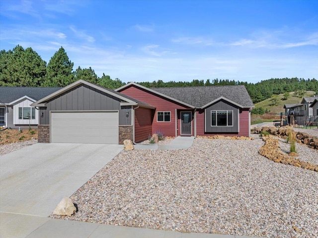 ranch-style home featuring a garage