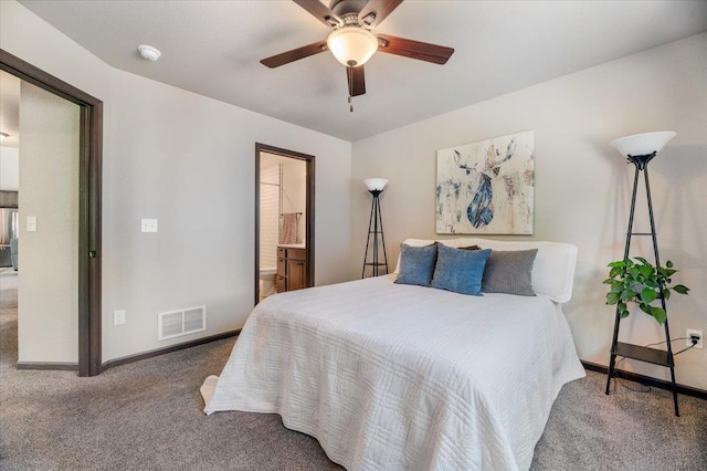 bedroom featuring carpet flooring, connected bathroom, and ceiling fan