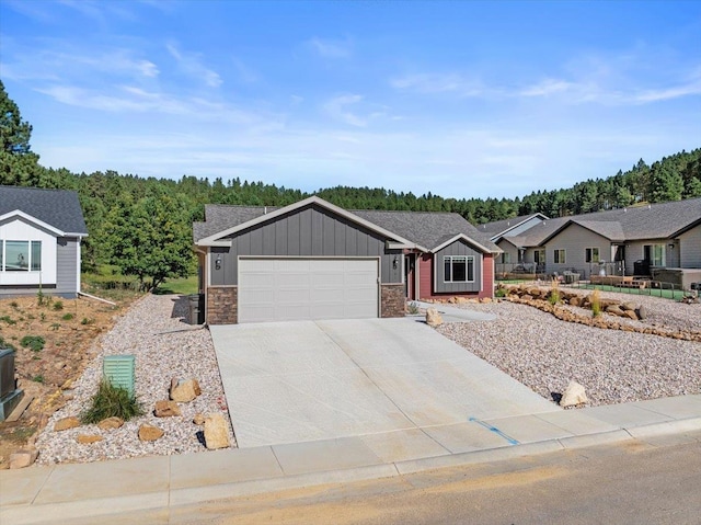 single story home featuring a garage